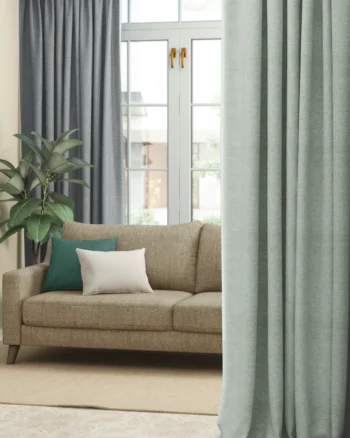 Premium textured furnishing fabric swatches in neutral earthy shades for upholstery and curtain applications by Aartex Furnishings